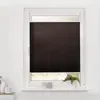 A dark brown pleated blind is installed in a white window frame, covering most of the glass. Produktbild-Vorschau