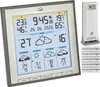 A TFA weather station with an outdoor sensor and batteries, displayed on a light gray and white background. Anteprima dell’immagine prodotto