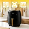 A black and gold air fryer is shown on a kitchen counter, with three yellow graphic icons above it. Produktbild-Vorschau