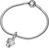 A silver Pandora charm bracelet with a snow globe charm. Podgląd zdjęcia produktu
