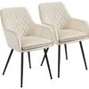 Two cream-colored chairs with diamond quilting and black metal legs are shown against a white background. Produktbild-Vorschau