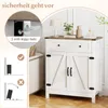 A white sideboard with a wooden top, featuring two doors and a drawer, is shown in a room setting. The image also includes inset graphics demonstrating safety features and product dimensions. Produktbild-Vorschau