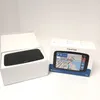 A TomTom Go Expert Plus navigation device is shown in its packaging next to its open box. Voir les images du produit