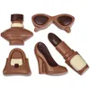 A collection of chocolate confectionery shaped like fashion accessories. Produktbild-Vorschau