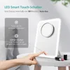 A hand is shown touching a makeup mirror with LED lights, with instructions on how to use it displayed on a graphic overlay. Podgląd zdjęcia produktu