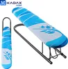A product shot of a small ironing board with a blue and white patterned cover, shown both assembled and folded. Produktbild-Vorschau