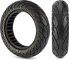 A black tire with gold studs and a side view of the same tire against a white background. Produktbild-Vorschau