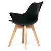 A black chair with wooden legs on a white background. Produktbild-Vorschau