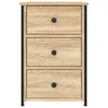 A front view of a three-drawer nightstand with a wood-grain finish and black metal frame. Náhled obrázku produktu