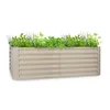 A raised garden bed filled with various green plants. Náhled obrázku produktu