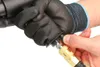 A gloved hand is connecting an air hose to a tool. Produktbild-Vorschau