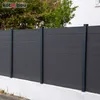 A dark gray fence made of horizontal planks supported by vertical posts. Produktbild-Vorschau