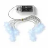 A string of snowflake-shaped LED lights connected to a battery pack. Náhled obrázku produktu
