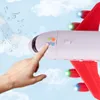 A hand is pressing buttons on a toy airplane with musical notes and clouds in the background. Produktbild-Vorschau