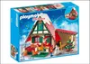 A Playmobil Christmas house playset box with Santa, a snowman, and a Christmas tree. Produktbild-Vorschau