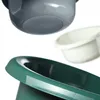 Close-up view of three plastic bowls in different colors. Produktbild-Vorschau