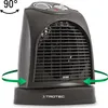 A dark gray TROTEC fan heater is shown from a slightly elevated front-left angle on a white background. Green arrows indicate a 90-degree oscillation range. Podgląd zdjęcia produktu