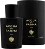 A black bottle of Acqua di Parma Oud Eau de Parfum and its matching black cylindrical box are displayed against a black background. Anteprima dell’immagine prodotto