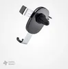 A black and silver car vent mount for a phone. Voir les images du produit
