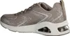 Side view of a beige sneaker with glitter accents. Voir les images du produit