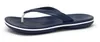 A single navy blue Crocs flip-flop with a white stripe on the sole, shown from a side angle on a white background. Produktbild-Vorschau
