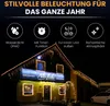 A building at night decorated with amber LED icicle lights. Produktbild-Vorschau