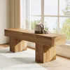 A wooden bench in a well-lit room with large windows and sheer curtains. Voir les images du produit
