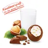 A glass of milk, hazelnuts, chocolate pieces, and a chocolate egg with a creamy filling are arranged on a white background, with a red text overlay. Podgląd zdjęcia produktu