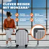 A woman is sitting on a bench with a suitcase next to her, in what appears to be an airport or train station. Anteprima dell’immagine prodotto