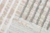 A close-up view of a textured rug with a striped pattern. Produktbild-Vorschau