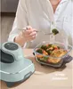 A person is using a Ninja air fryer to cook food, which is served in a glass container. Anteprima dell’immagine prodotto