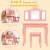A collage of images showcasing a pink children's vanity set in two configurations: as a makeup table and as a desk. The main image shows the vanity with its tri-fold mirror and stool. Produktbild-Vorschau
