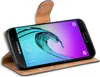 A Samsung smartphone in a brown flip case, displayed at an angle. Produktbild-Vorschau