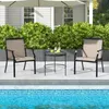 Two outdoor chairs and a small table are set up on a patio next to a swimming pool. Produktbild-Vorschau