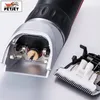 A close-up view of a pet grooming clipper with its blade detached, showing internal components. Produktbild-Vorschau