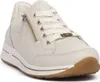 A close-up, studio shot of a single cream-colored leather sneaker. Náhled obrázku produktu