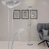 A modern living room with a gray armchair and three floor lamps. Anteprima dell’immagine prodotto