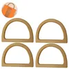 Four wooden D-shaped bag handles are arranged in a two-by-two grid against a white background, with a small inset image of a bag with similar handles in the top left corner. Produktbild-Vorschau