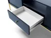 A close-up view of an open drawer on a dark blue cabinet with gold accents. Podgląd zdjęcia produktu