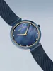 A close-up studio shot of a Bering women's watch with a dark blue mother-of-pearl dial and a blue mesh stainless steel band. Produktbild-Vorschau