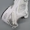 Close-up view of a pair of New Balance running shoes. Podgląd zdjęcia produktu