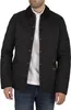 A man wearing a black quilted jacket over a white polo shirt and blue jeans. Produktbild-Vorschau