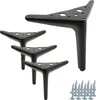 A set of four black metal furniture legs and a pile of screws on a white background. Produktbild-Vorschau