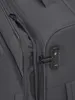 A close-up view of a dark gray suitcase, focusing on the zipper and a TSA-approved combination lock. Produktbild-Vorschau