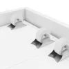 Close-up view of the bottom of a white furniture item, showing three white wheels with metal brackets attached to the surface. Náhled obrázku produktu