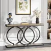 A console table with decorative items and a bookshelf in the background. Podgląd zdjęcia produktu
