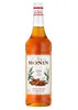 A bottle of Monin Cinnamon syrup against a white background. Podgląd zdjęcia produktu