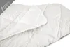 A white duvet is folded and partially opened, showing its quilted texture. Produktbild-Vorschau