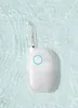 A white water flosser is submerged in light blue water. Náhled obrázku produktu