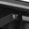 A close-up view of a black cable emerging from a black surface. Podgląd zdjęcia produktu